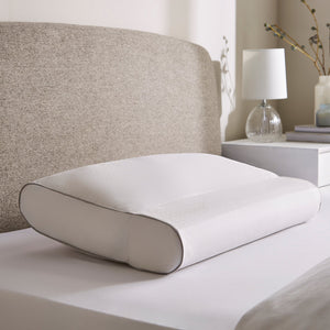 Cooling Head & Neck Pillow On a Bed